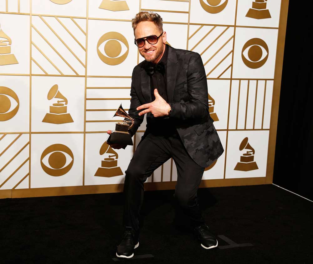 Photo Of Tobymac Holding The Grammy Award For Best Contemporary Christian Music Album